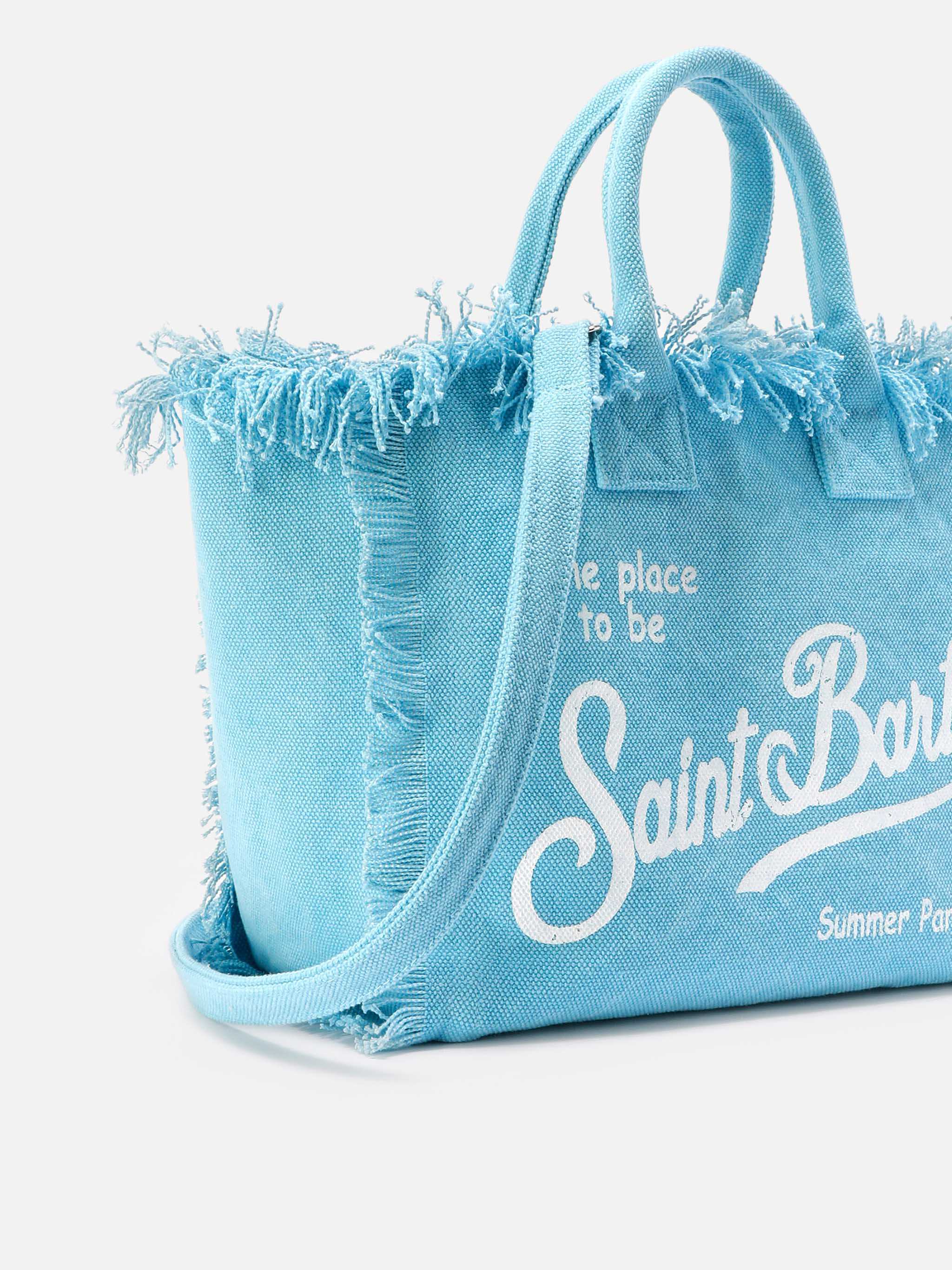 Bolso Colette azul claro de lona con flecos
