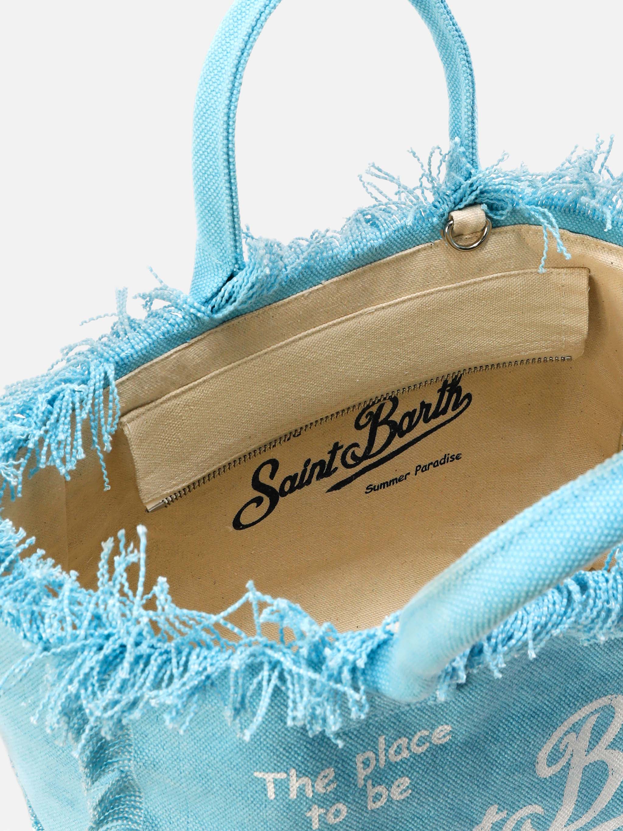 Bolso Colette azul claro de lona con flecos