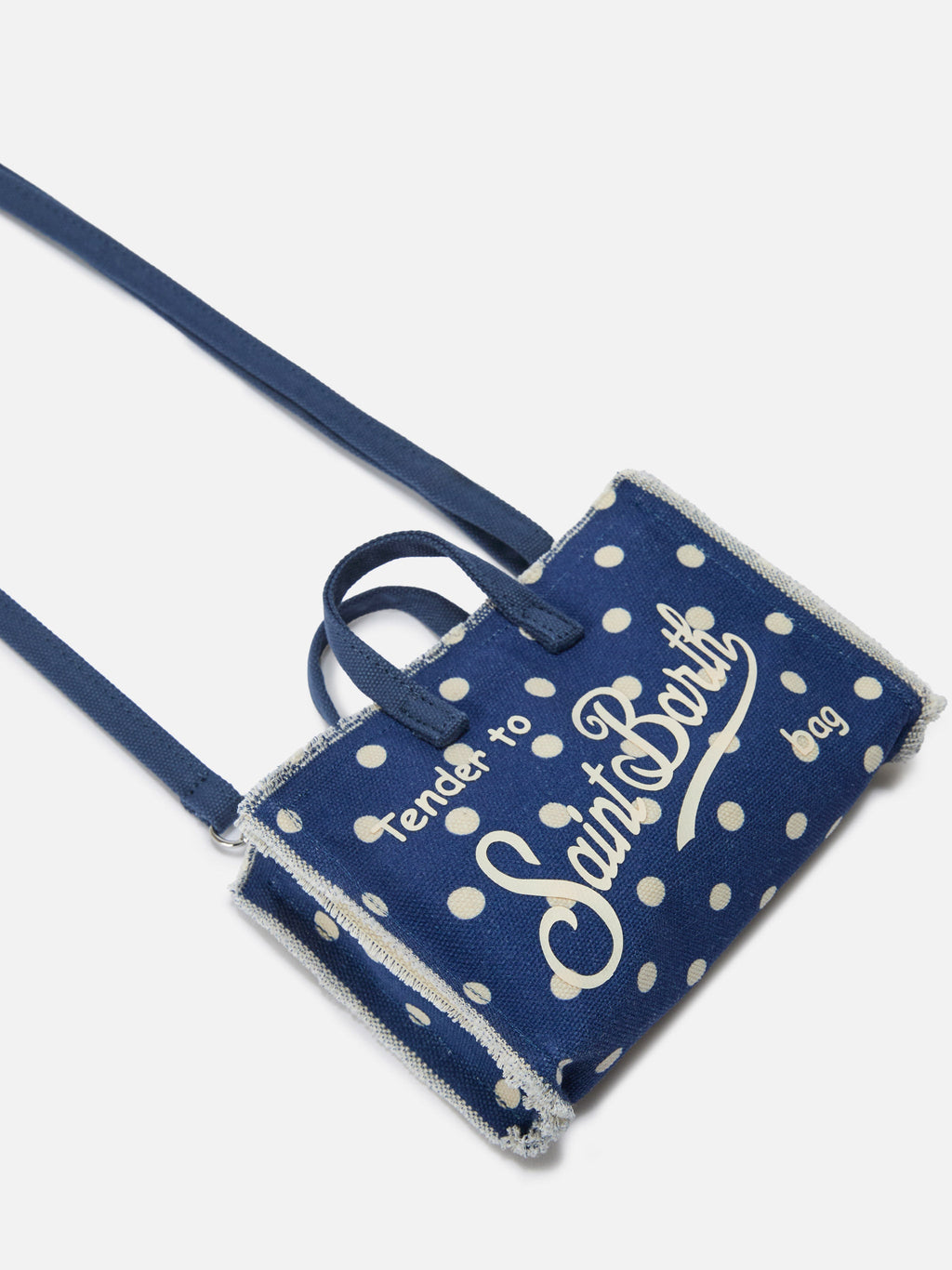 Bolso para teléfono micro de lona azul con lunares y logo en contraste