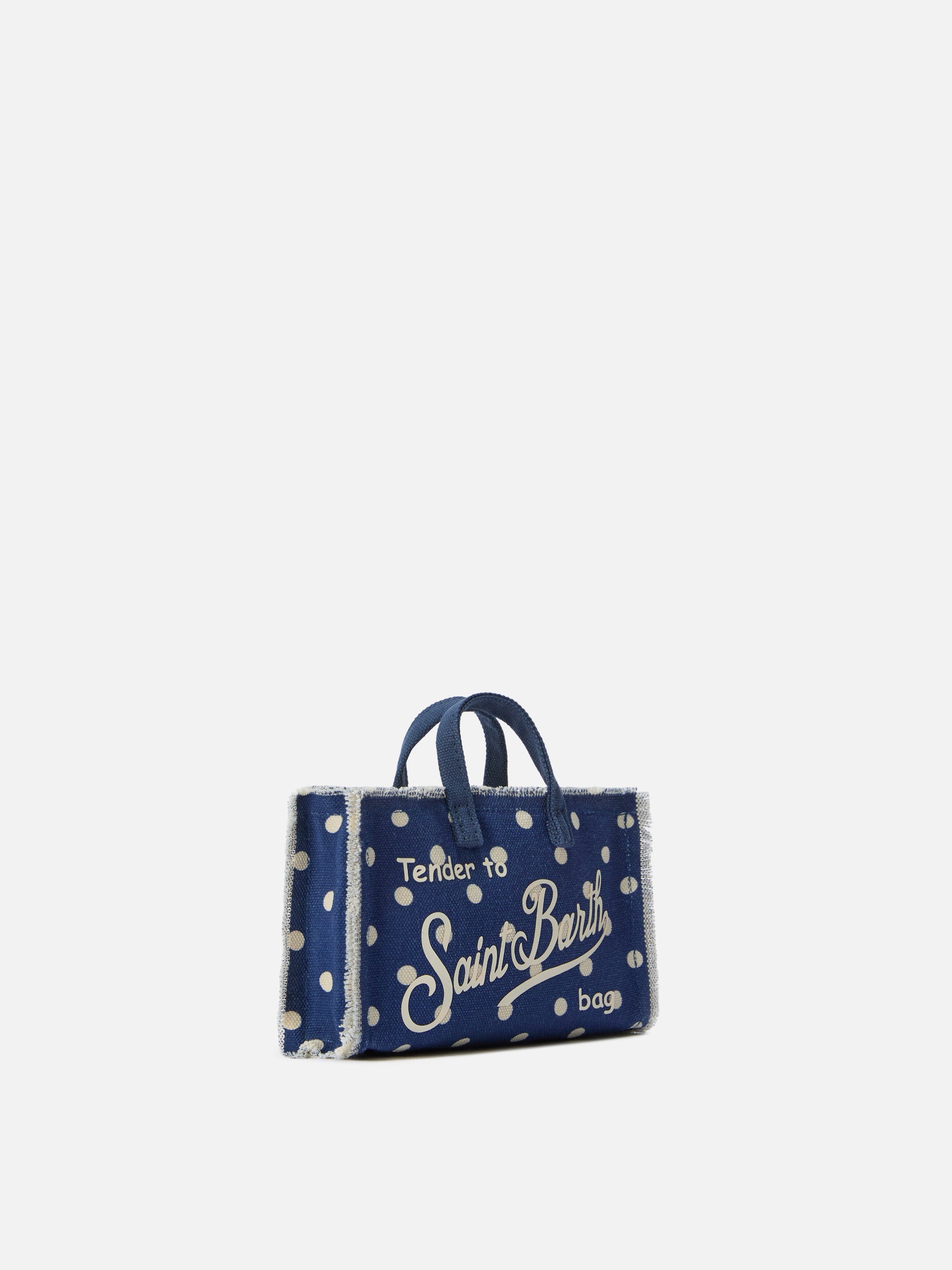 Bolso para teléfono micro de lona azul con lunares y logo en contraste