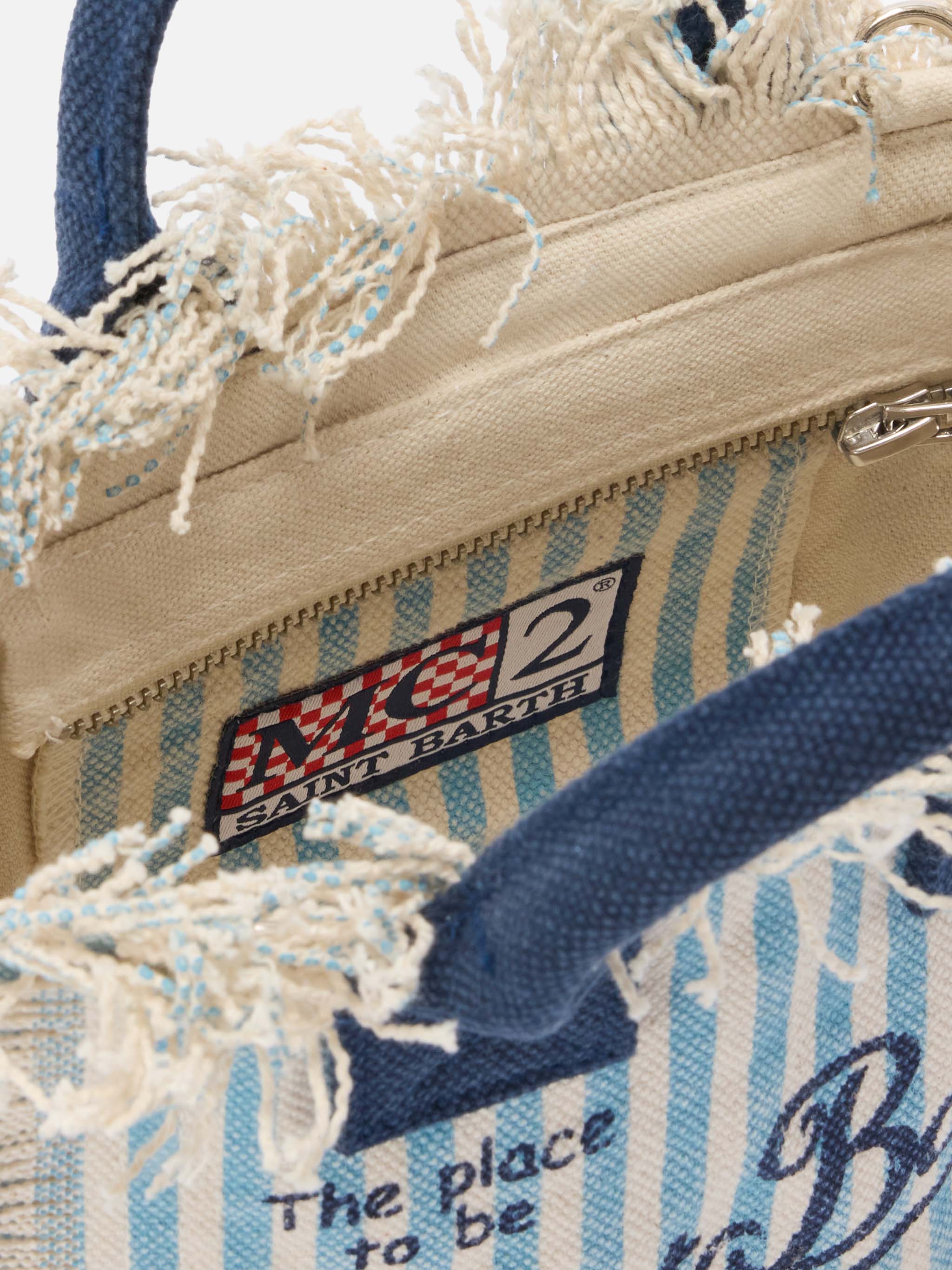Neceser mini de lona a rayas azules con detalles azules