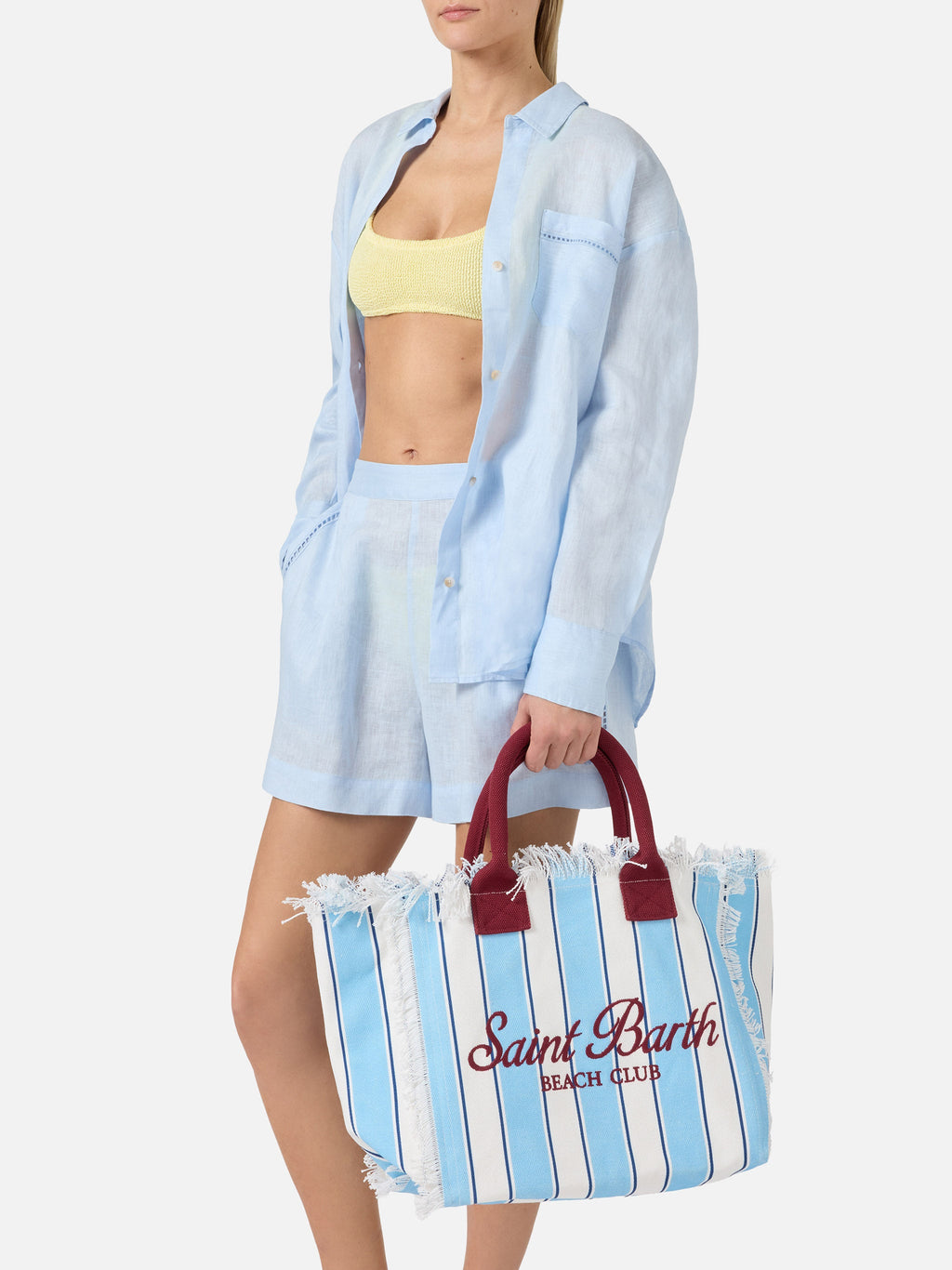 Bolso Vanity regular de lona a rayas azules con detalles bordó
